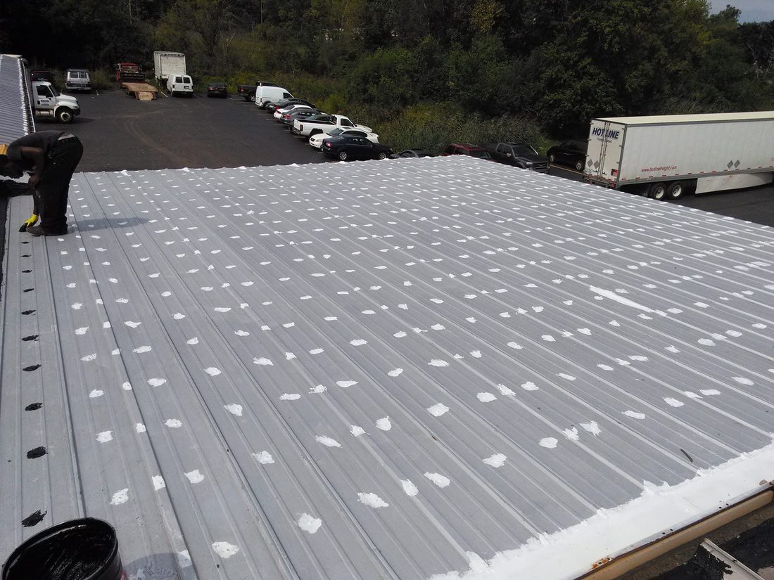 Industrial metal roof with seams sealed